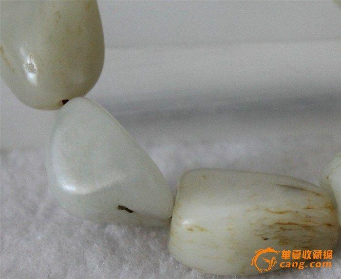 这条手串是新疆和田籽料吗,有没有修型?_这条