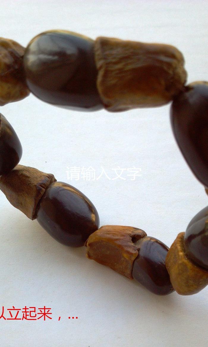一串很特别的手串,请教高手鉴定是神马?_一串