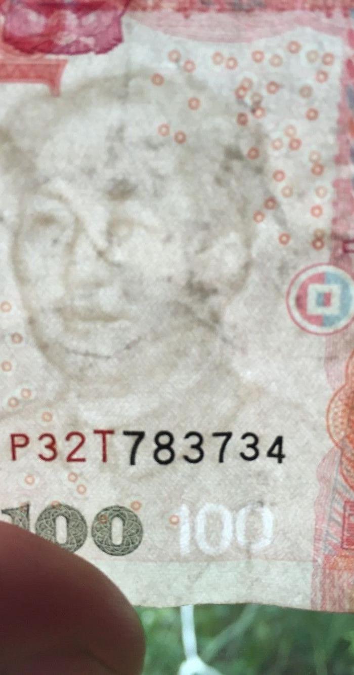 2005版100元人民币水印眼睛位移_2005版100