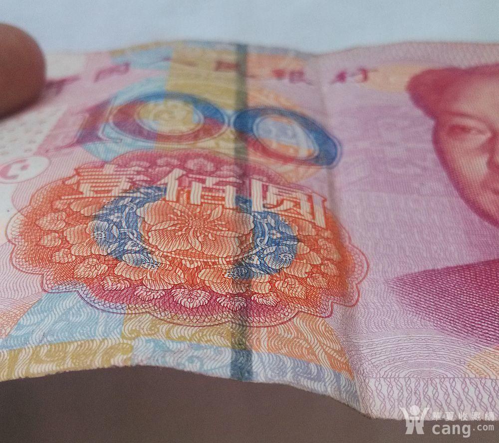 2005版人民币,中间银条发黑,特别明显,是否为错币.